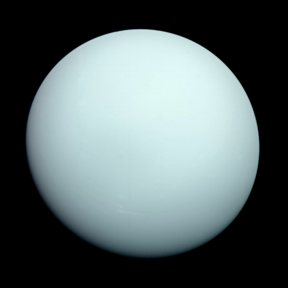 Uranus showing pale blue-green color